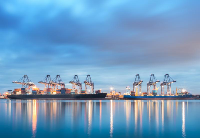 Dock Cranes, Eight Cranes Pointing Right Left Reflections off water, lighter blue AdobeStock_118826659.jpeg