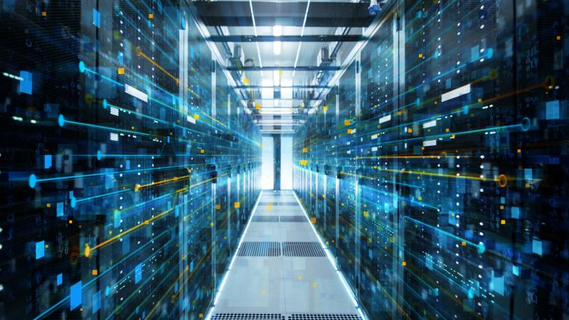 Cloud Computing Facility Blue Centered Aisle AdobeStock_200146313.jpeg