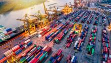 Dock: Green, Water, Ship, Cranes, Many Containers AdobeStock_178511528.jpeg